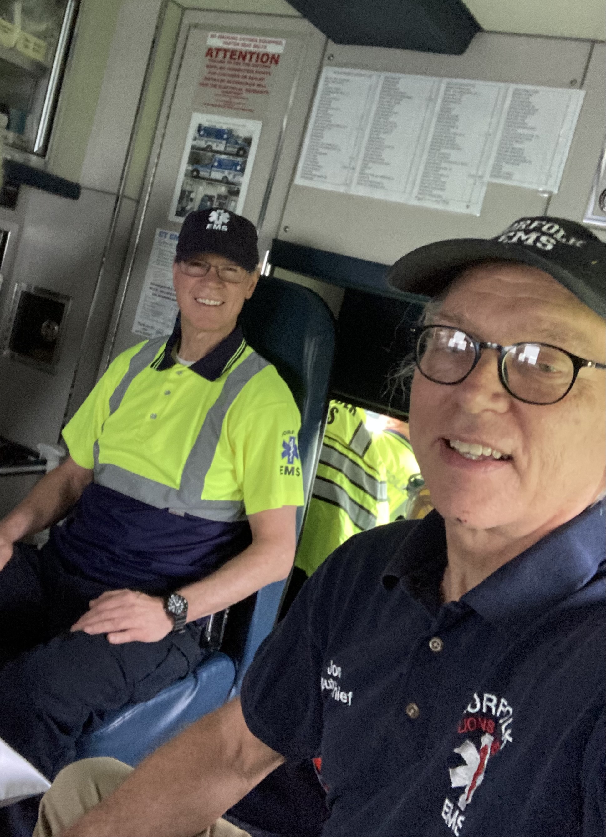 Volunteers inside ambulance
